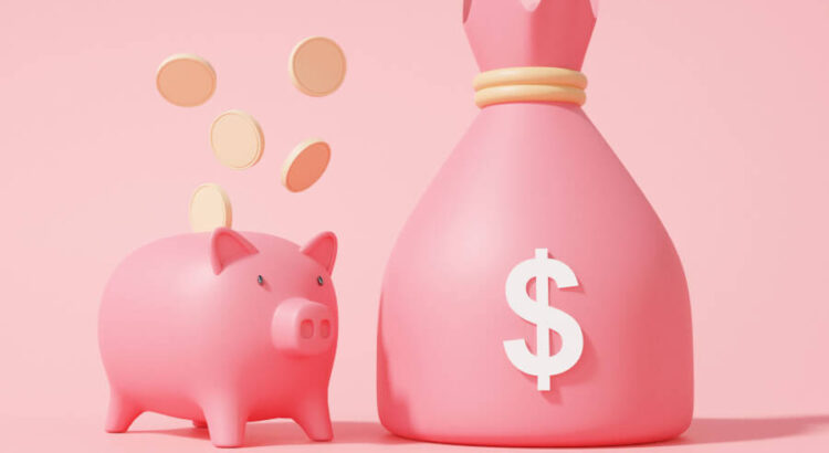 ピンクの豚の貯金箱とコイン